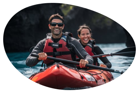 A man and woman paddling in a kayak on a serene lake A man and woman paddling in a kayak on a serene lake
