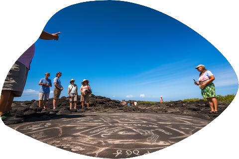 People gathered on a rock with others forming a circle, enjoying the beach scenery and soothing ocean sounds People gathered on a rock with others forming a circle, enjoying the beach scenery and soothing ocean sounds