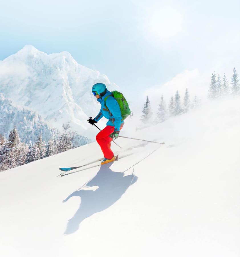 A skier gracefully descends a snowy slope, surrounded by a winter landscape