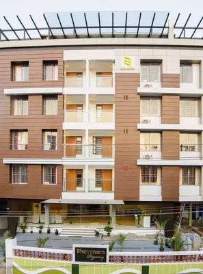 a  multi-story building with glass windows