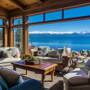 A living room with lake and mountain scenery.