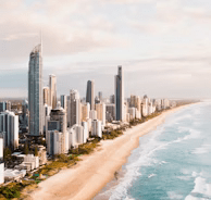 High rise buildings near sea during daytime