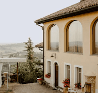 Gazebo outside white painted building