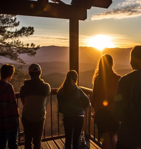 Multiple guests comfortably accommodated by a 4-bedroom cabin overlooking the Smoky Mountains