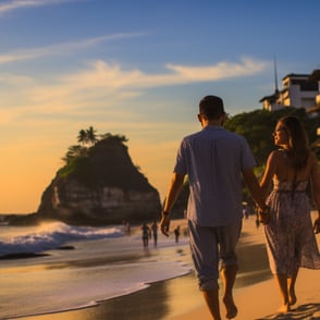 A couple strolling on the beach at sunset, holding hands and enjoying the beautiful view of the ocean.