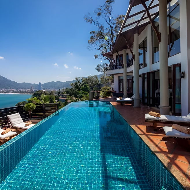 A pool with a view of the Patong Beach A pool with a view of the Patong Beach