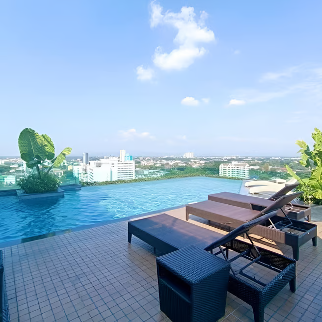 A pool with a view of the Patong Beach A pool with a view of the Patong Beach