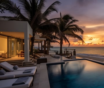 a beachside villa in Cancun, Mexico during sunset