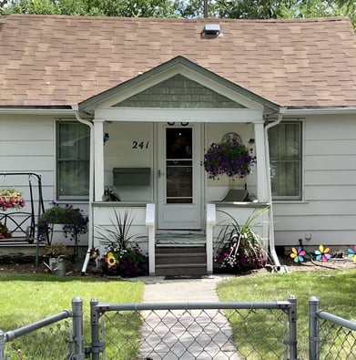 A house with a mailbox in front of a fence in Riverton, Wyoming