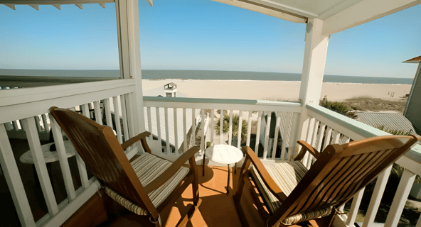 two chairs in balcony with sea view