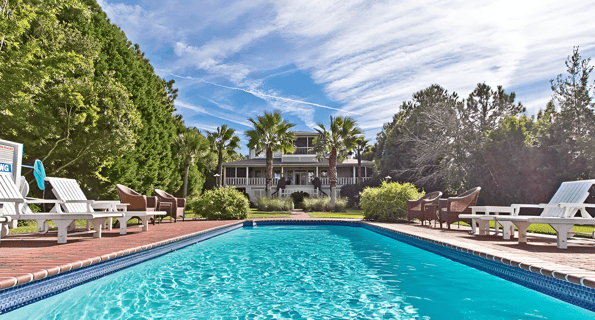 A large swimming pool during sunny day