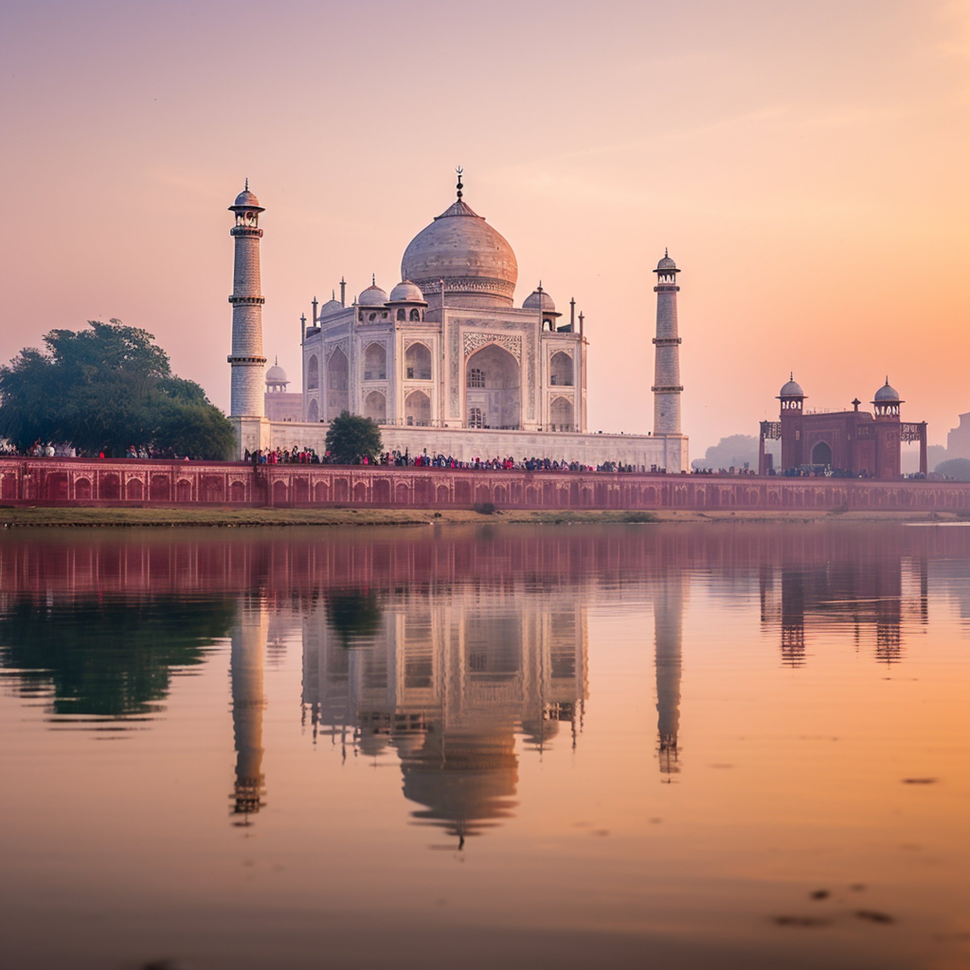 the iconic taj mahal is bathed in the soft pastel