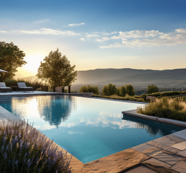a pool view surrounding by trees