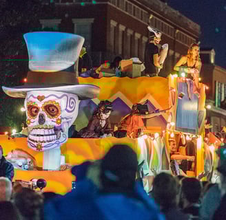 A skull wearing a hat on a float