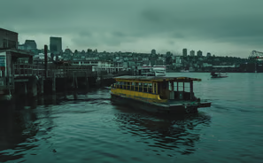 Moody skies over tranquil waters, city's pulse in quietude. Moody skies over tranquil waters, city's pulse in quietude.