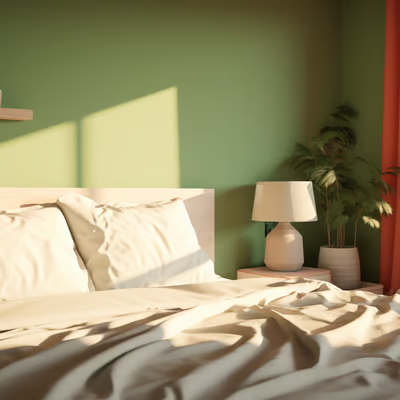 a bed with a white bed and a lamp a bed with a white bed and a lamp