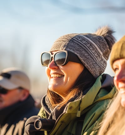 A woman with long hair and sunglasses on a sunny day A woman with long hair and sunglasses on a sunny day