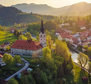 Picturesque lake surrounded by spring greenery.