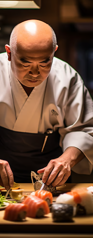 A japanese chef making sushi A japanese chef making sushi