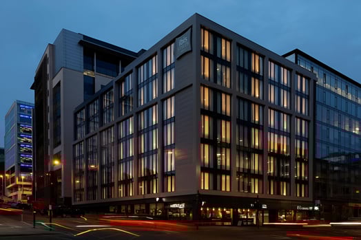 a hotel with a lot of windows in glasgow city centre