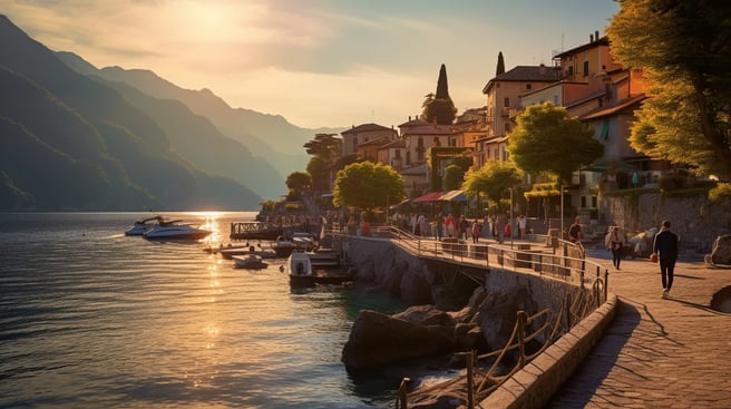 A group of people walking down a path next to a body of water A group of people walking down a path next to a body of water
