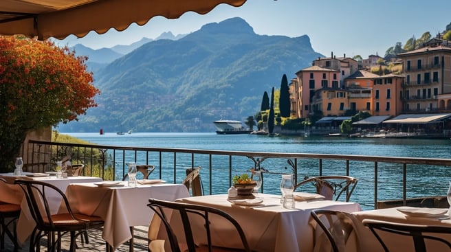 a restaurant with tables and chairs and a view of the mountains