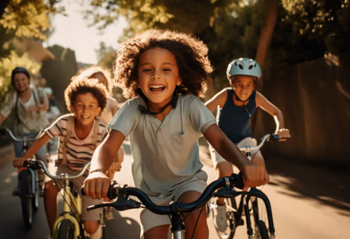 a bunch of kids biking through the low-traffic streets of Anderson Island, WA a bunch of kids biking through the low-traffic streets of Anderson Island, WA