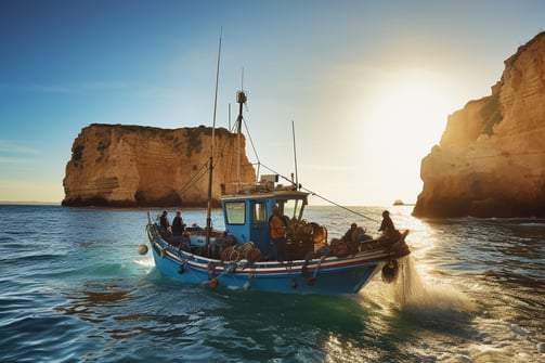 A fishing boat on the clear waters of the Algarve, Portugal A fishing boat on the clear waters of the Algarve, Portugal