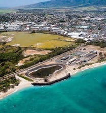 a large body of water with a small island