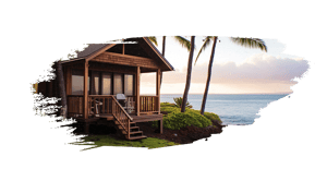 A small wooden house with palm trees in the background, surrounded by lush greenery.