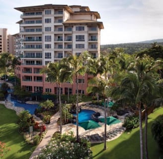a large building with a swimming pool