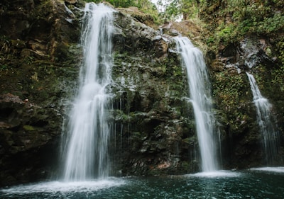 a large waterfall with lots of water coming out of it