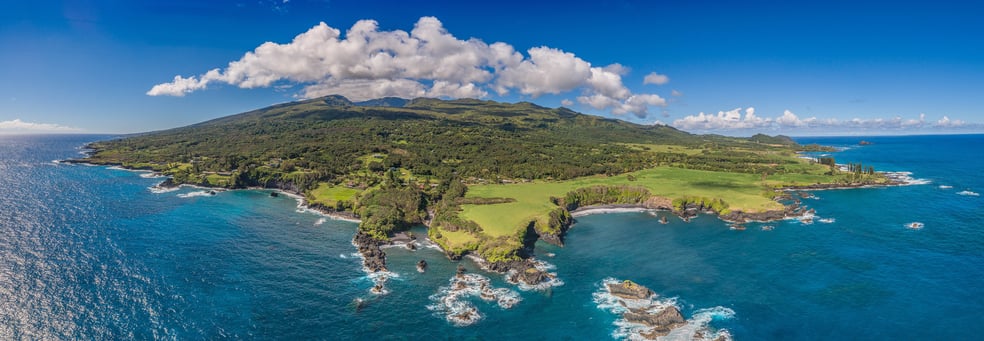 a large body of water with a small island a large body of water with a small island