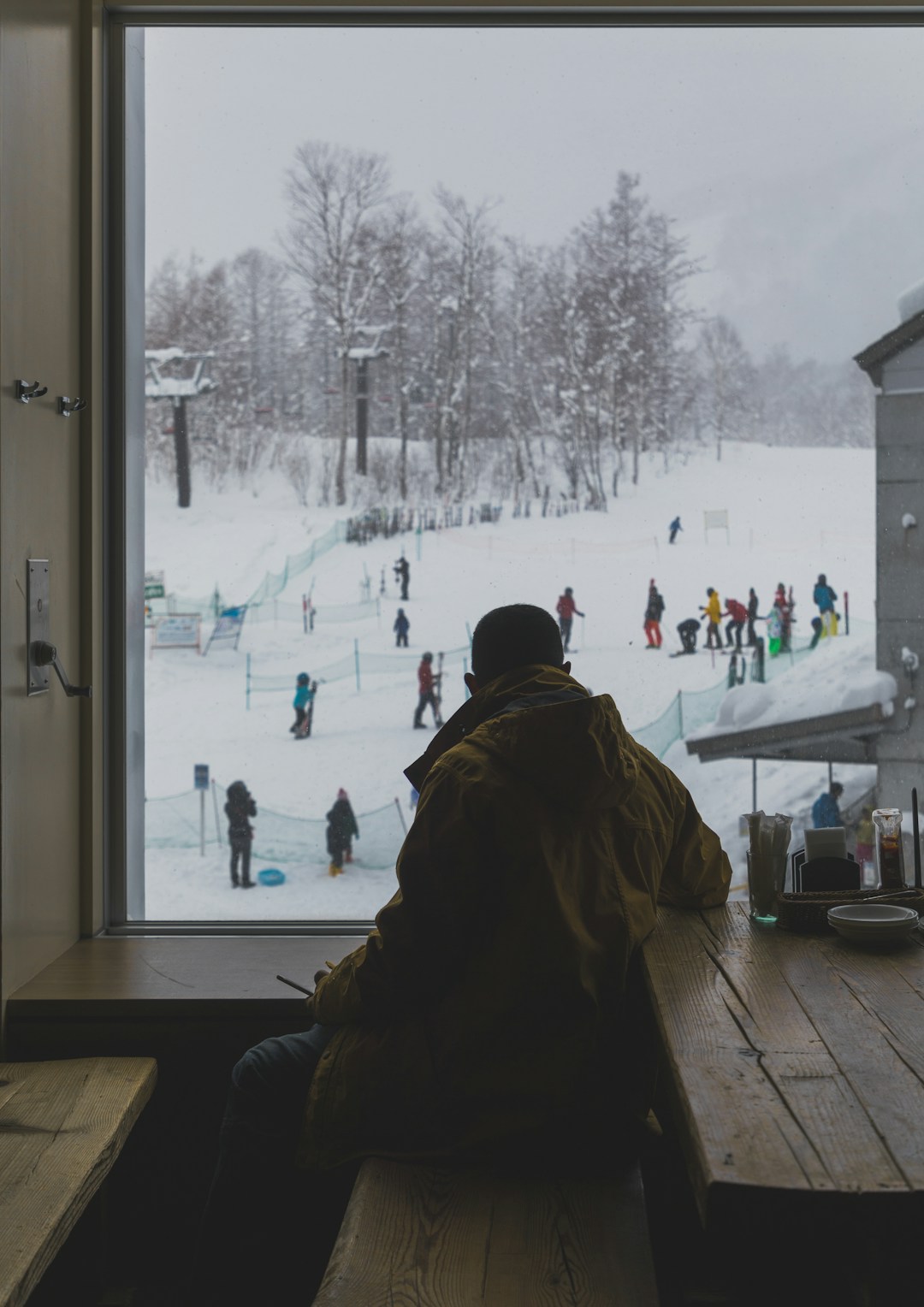 People walking on snow covered ground during daytime