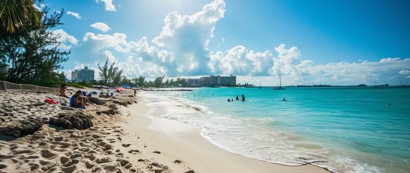 tourists sunbathing on the sands of Delaporte Point in Nassau during high noon.