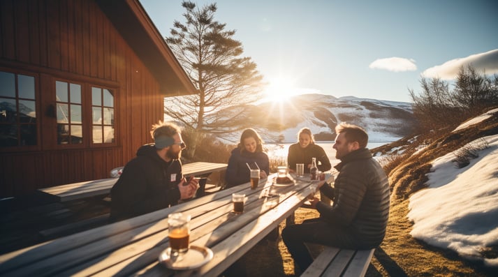 A group enjoying breakfast in a cottage in Norway