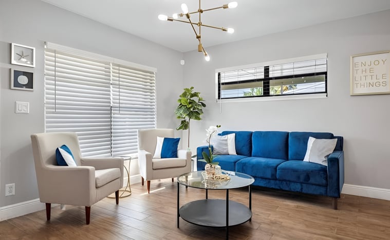 A living room with couch and chairs in hollywood beach, florida A living room with couch and chairs in hollywood beach, florida