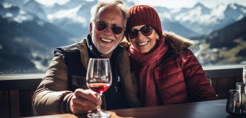 A married couple enjoying their food & wine tour in the alps A married couple enjoying their food & wine tour in the alps