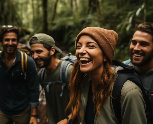 a group of people walking through a forest a group of people walking through a forest