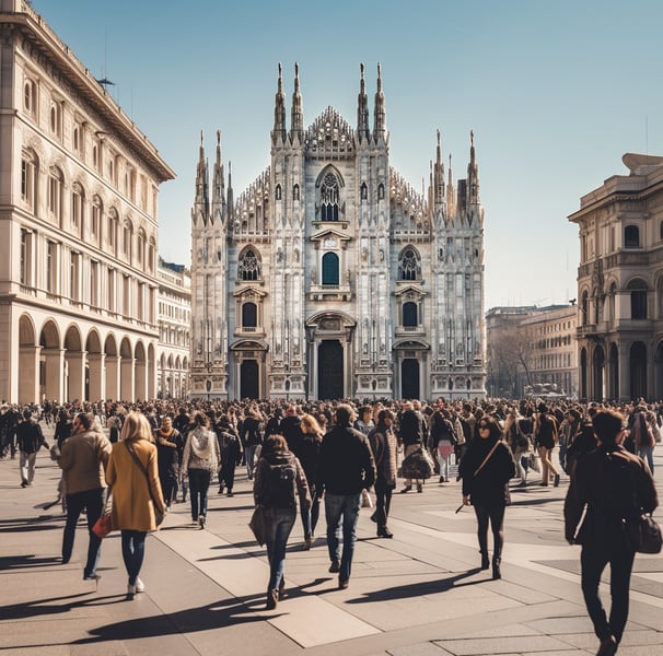A diverse group of people strolls in front of a grand cathedral, showcasing the architectural beauty and lively atmosphere