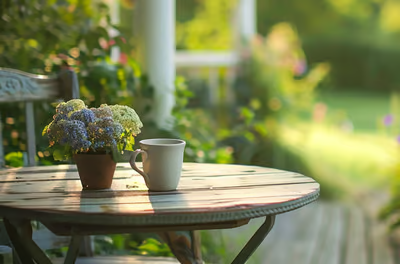 Morning Serenity: Coffee on a Cottage Porch in the Hamptons.