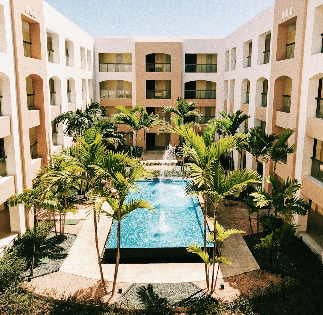 White and brown concrete building White and brown concrete building