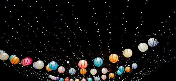 assorted-color Japanese lantern lot with black background assorted-color Japanese lantern lot with black background