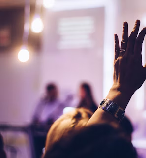 person raising hand person raising hand