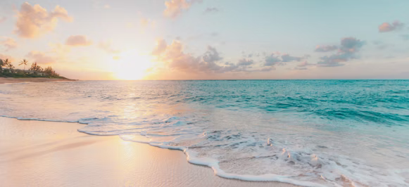 woman standing on beach sand woman standing on beach sand