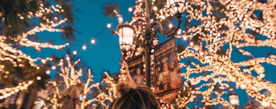 woman seeing string lights woman seeing string lights