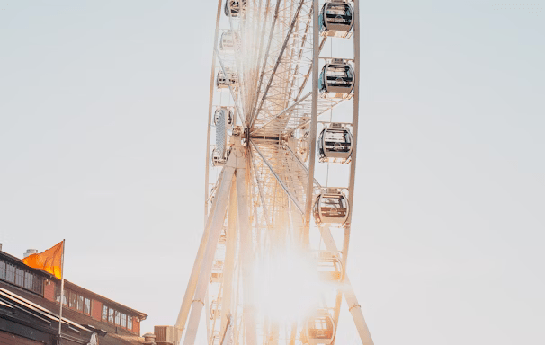 Ferris Wheel under blue sky Ferris Wheel under blue sky