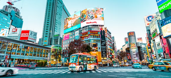 white and red buss on the middle of crossing street photo white and red buss on the middle of crossing street photo