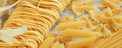 yellow pasta on white paper yellow pasta on white paper
