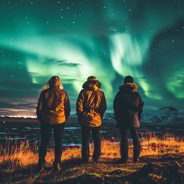 Under the mesmerizing aurora borealis, three adventurers celebrate the thrill of exploring the world's wonders in their retirement Under the mesmerizing aurora borealis, three adventurers celebrate the thrill of exploring the world's wonders in their retirement